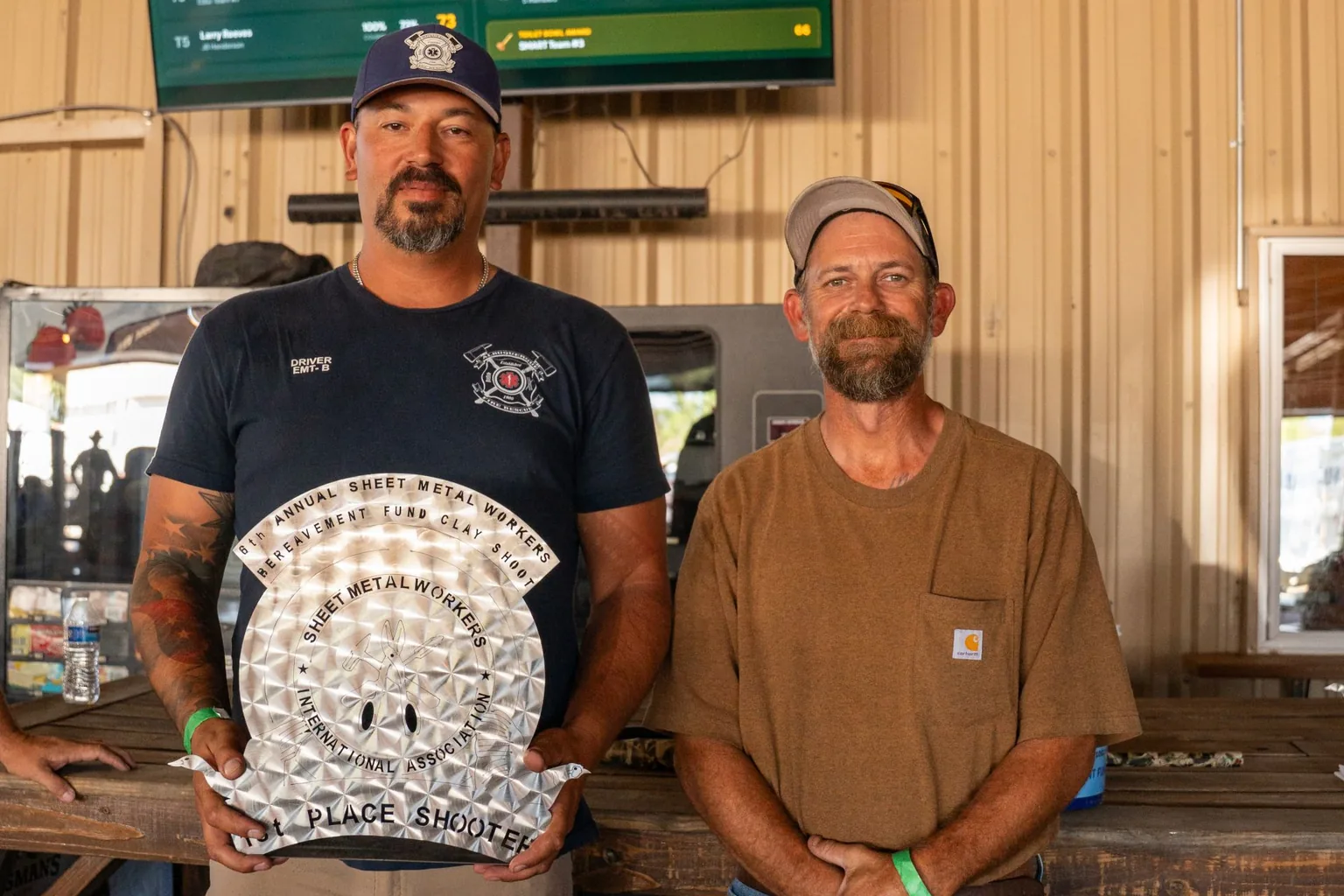 The first-place shooter holds his trophy at Local 49’s charity clay tournament.