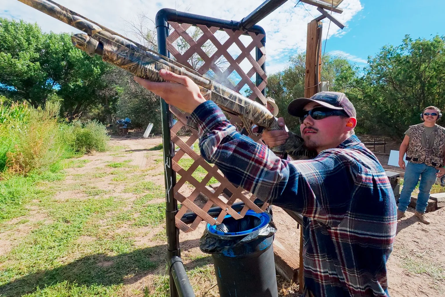 A participant takes aim at a shooting station during Local 49’s charity clay tournament.